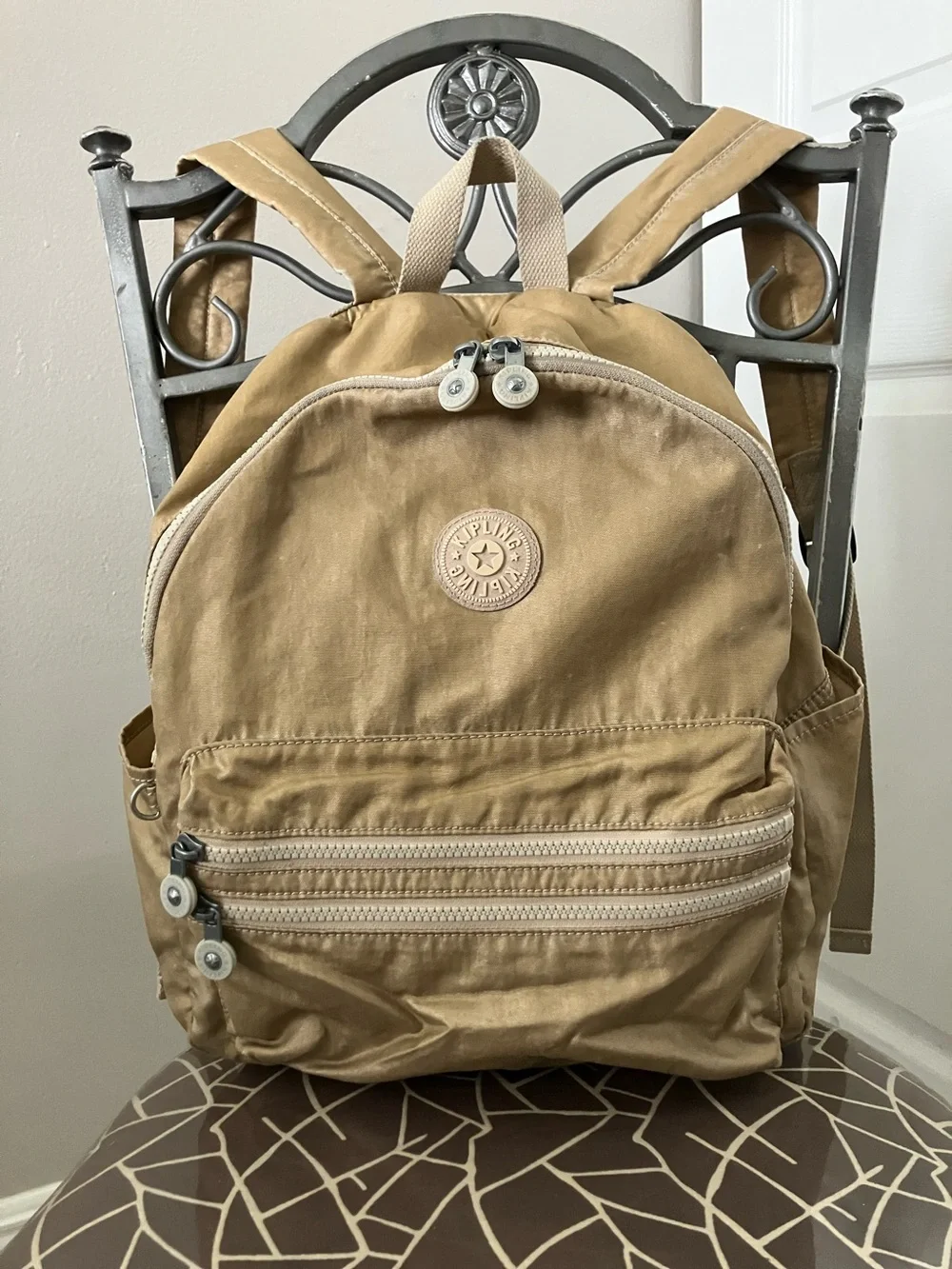 KIPLING Ezra travel backpack in a gleaming gold metallic color